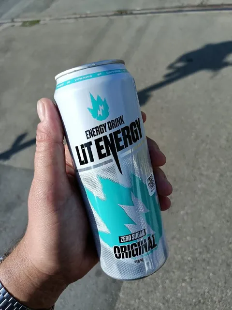 Holding a Lit Energy Can